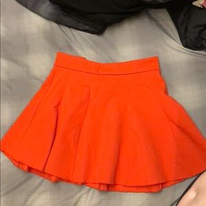 Blood orange pleated mini skirt